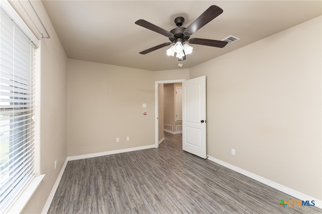 unfurnished bedroom with hardwood / wood-style flooring and ceiling fan