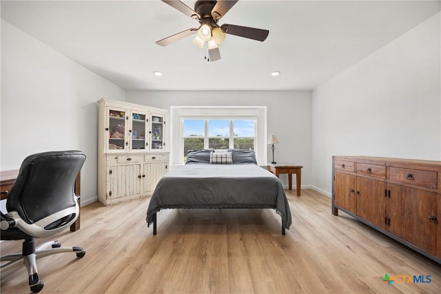 921 Indian Trl, Harker Heights, TX 76548 - bedroom featuring light wood finished floors, baseboards, a ceiling fan, and recessed lighting