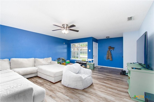 3605 Pleasing Cir, Killeen, TX 76542 - living area featuring wood finished floors and a ceiling fan