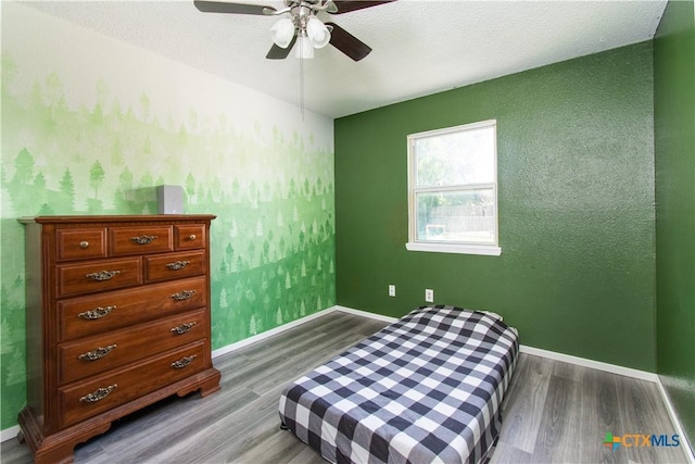 3605 Pleasing Cir, Killeen, TX 76542 - bedroom with wood finished floors and a ceiling fan