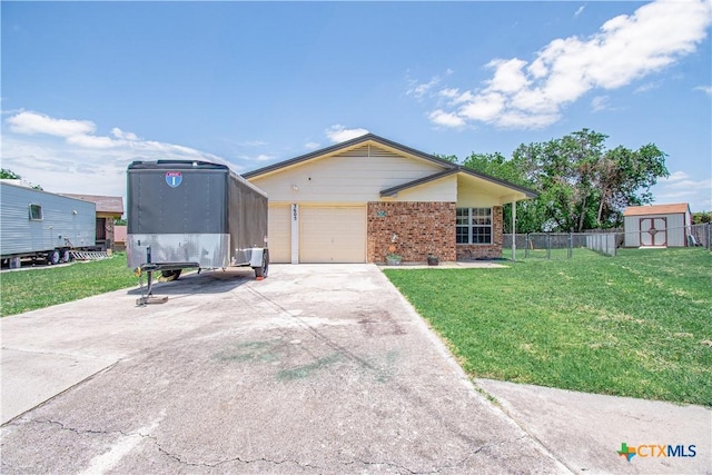 3605 Pleasing Cir, Killeen, TX 76542 - view of front of house featuring a storage unit, brick siding, driveway, and an attached garage