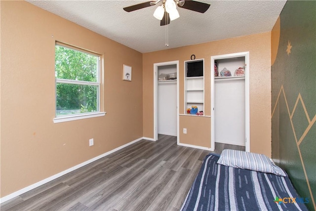 3605 Pleasing Cir, Killeen, TX 76542 - unfurnished bedroom with a textured ceiling, wood finished floors, and ceiling fan