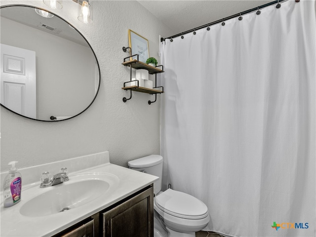 2416 Kolton St, New Braunfels, TX 78130 - full bath with vanity, a textured wall, a textured ceiling, and a shower with curtain