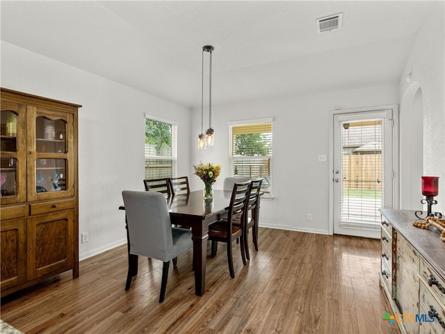 2416 Kolton St, New Braunfels, TX 78130 - dining space featuring wood finished floors and arched walkways