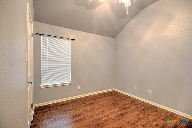 1900 Rutherford Dr, Leander, TX 78641 - empty room with wood finished floors, ceiling fan, and lofted ceiling
