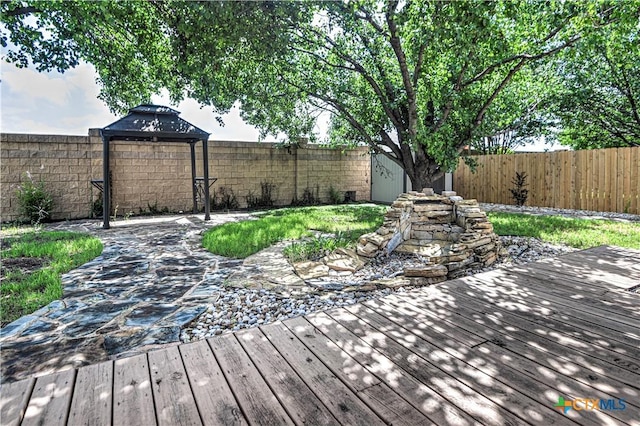 1900 Rutherford Dr, Leander, TX 78641 - wooden terrace featuring a fenced backyard and a gazebo