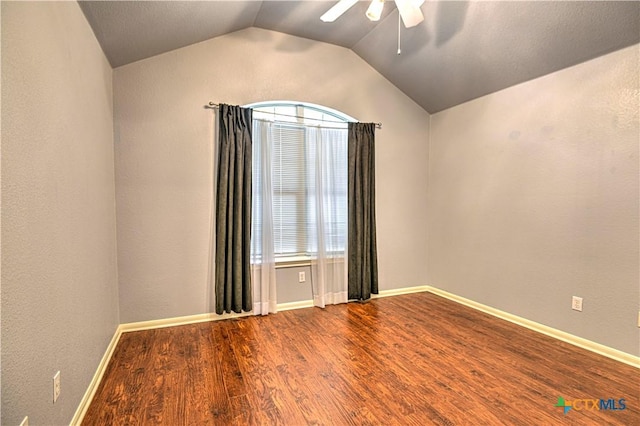 1900 Rutherford Dr, Leander, TX 78641 - unfurnished room featuring a ceiling fan, wood finished floors, and vaulted ceiling