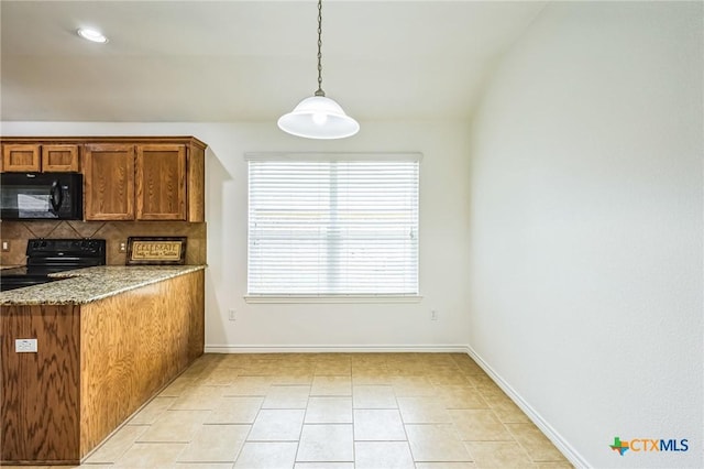 kitchen featuring decorative light fixtures, tasteful backsplash, light tile patterned floors, black appliances, and light stone countertops