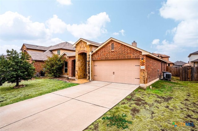 view of front facade with a front yard and a garage