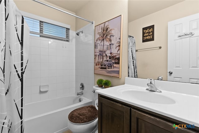 full bathroom with shower / tub combo, vanity, and toilet