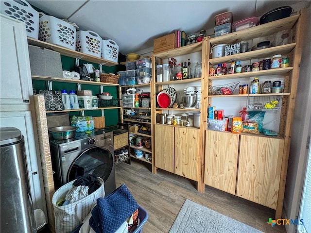 storage room featuring washer / dryer