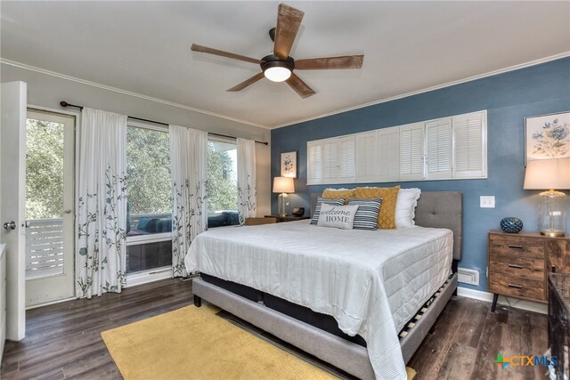 bedroom featuring access to exterior, multiple windows, and dark wood-type flooring