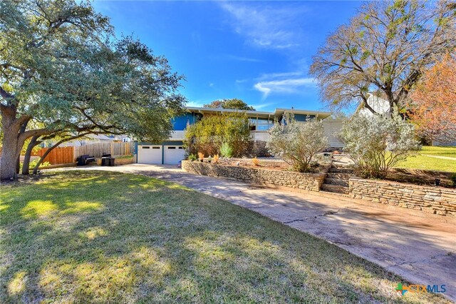 view of yard with a garage