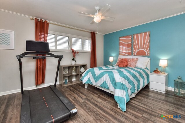 bedroom with ceiling fan, dark hardwood / wood-style flooring, and crown molding