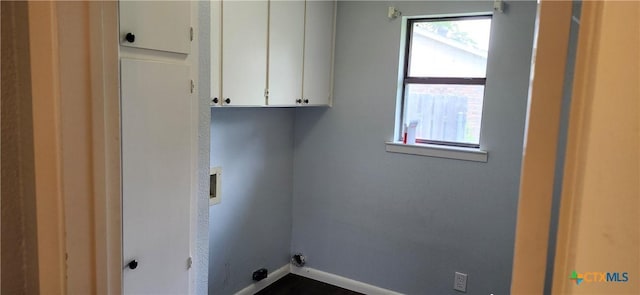 217 Taylors Dr, Temple, TX 76502 - laundry area featuring cabinet space and baseboards