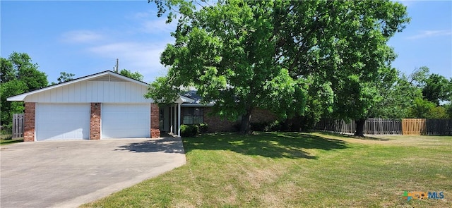 217 Taylors Dr, Temple, TX 76502 - view of front of home with brick siding, driveway, and an attached garage