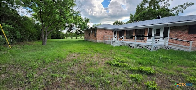 217 Taylors Dr, Temple, TX 76502 - view of green lawn featuring a deck