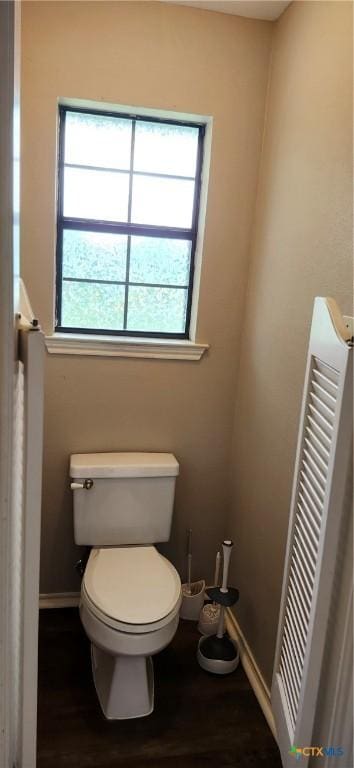 217 Taylors Dr, Temple, TX 76502 - bathroom featuring toilet, wood finished floors, and baseboards