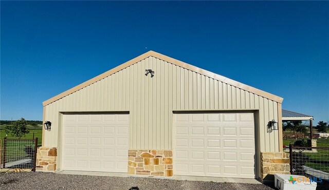 detached garage with fence