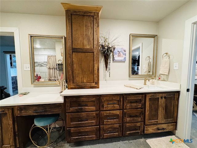 bathroom with double vanity and a sink