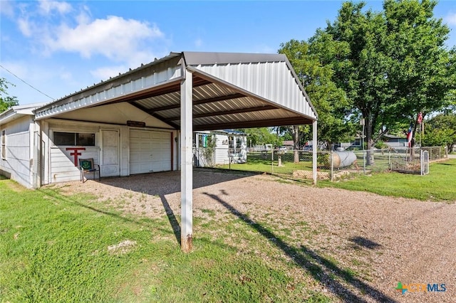 134 Daisy Ln, Whitney, TX 76692 - view of car parking featuring a detached garage