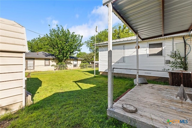 134 Daisy Ln, Whitney, TX 76692 - view of green lawn featuring a deck