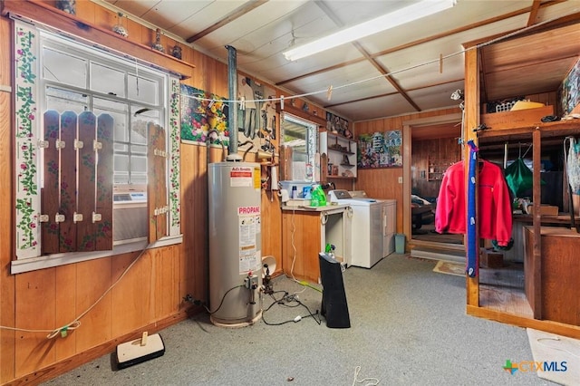 134 Daisy Ln, Whitney, TX 76692 - basement with gas water heater, washing machine and dryer, and wooden walls