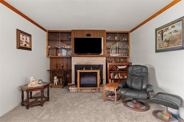 134 Daisy Ln, Whitney, TX 76692 - carpeted living area with ornamental molding, a brick fireplace, and a textured ceiling
