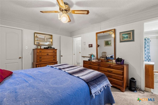 134 Daisy Ln, Whitney, TX 76692 - bedroom with carpet flooring, a textured ceiling, a ceiling fan, and ensuite bath