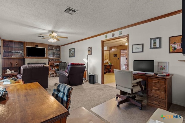 134 Daisy Ln, Whitney, TX 76692 - carpeted office with a ceiling fan, a textured ceiling, crown molding, and baseboards