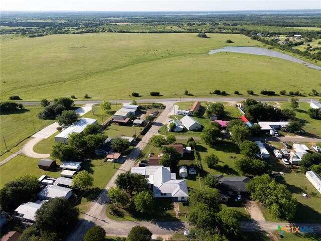 134 Daisy Ln, Whitney, TX 76692 - aerial overview of property's location with a nearby body of water, nearby suburban area, and rural landscape