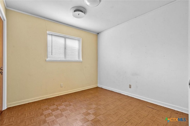 unfurnished room with light parquet floors