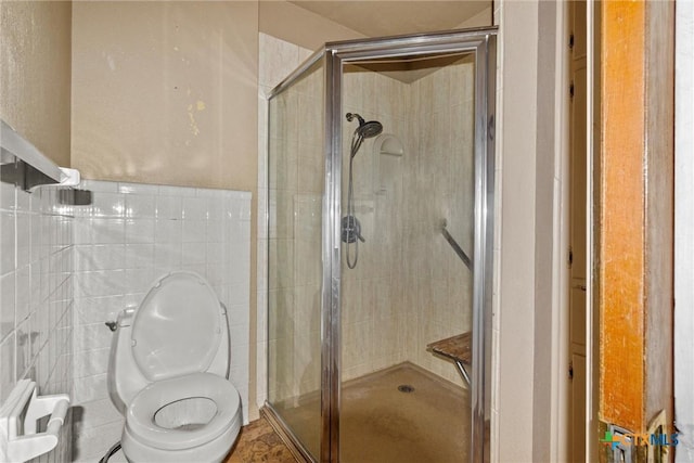 bathroom with toilet and walk in shower