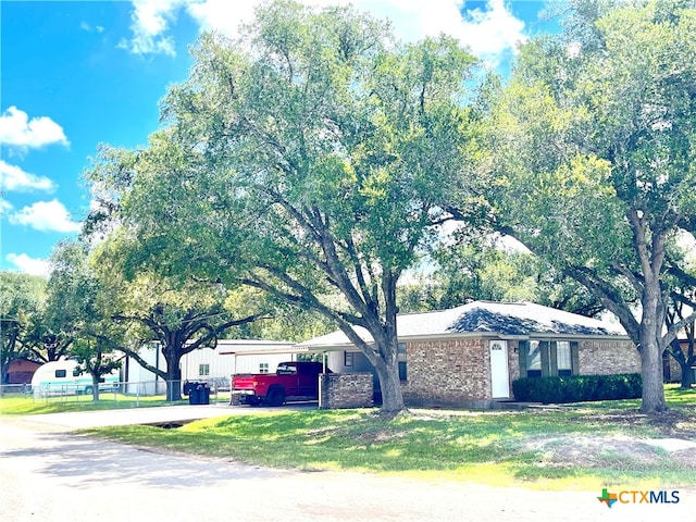 ranch-style house with a carport