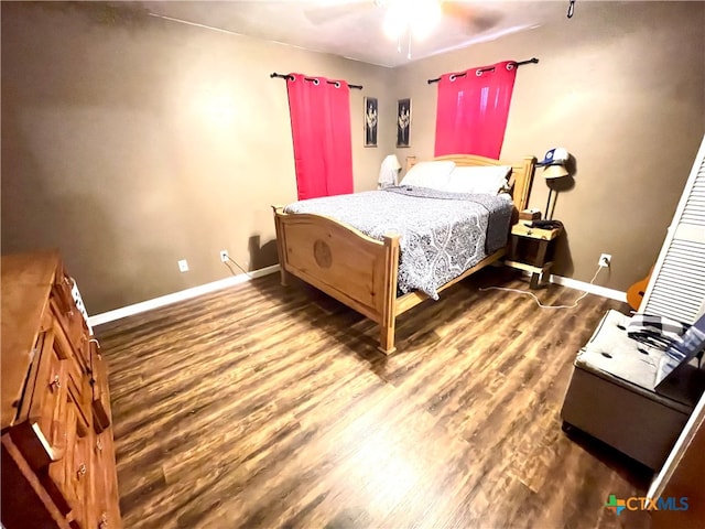 bedroom featuring ceiling fan and wood-type flooring