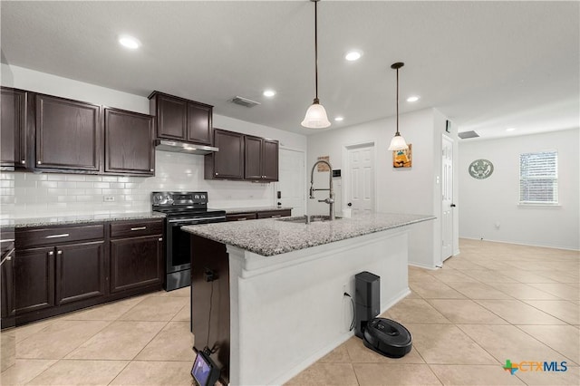 kitchen featuring under cabinet range hood, light tile patterned flooring, stainless steel electric range oven, and a sink