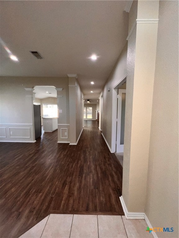 hallway featuring dark wood-type flooring