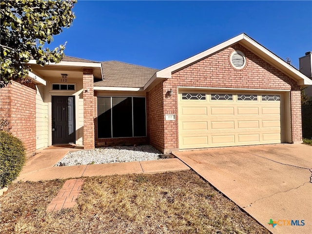 ranch-style home with a garage