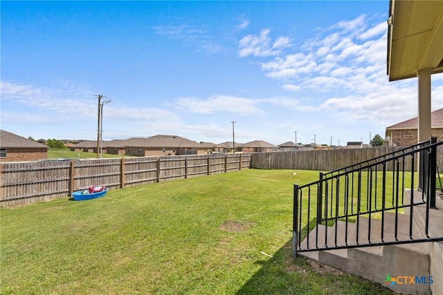 view of yard with a residential view