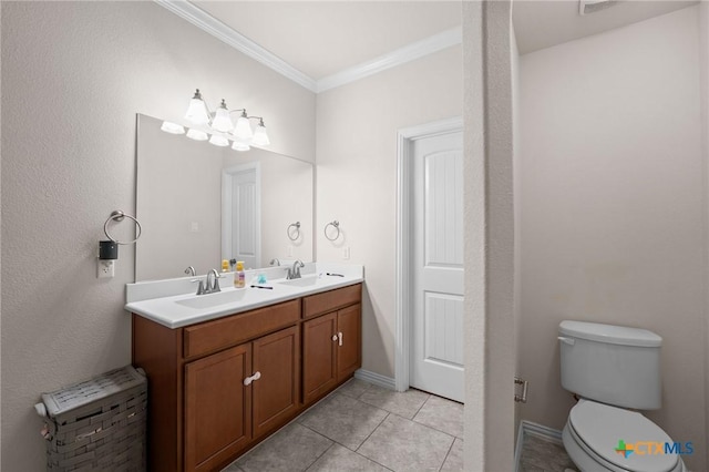 bathroom featuring ornamental molding, tile patterned flooring, double vanity, toilet, and baseboards