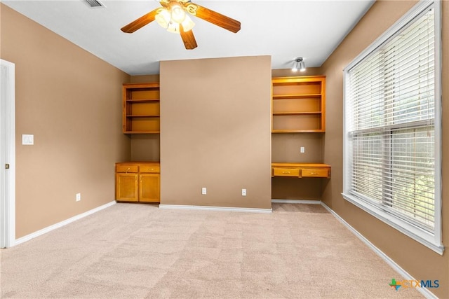 803 S Converse St, Flatonia, TX 78941 - empty room with ceiling fan and light colored carpet