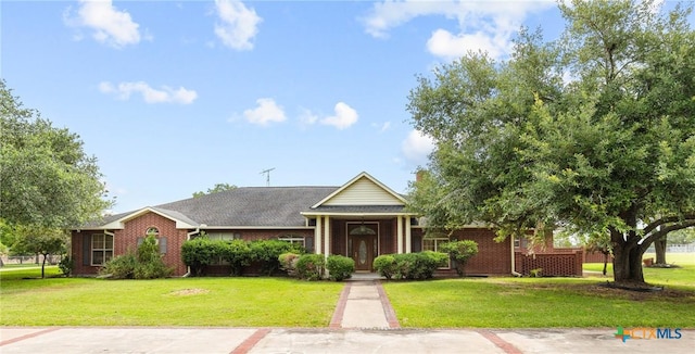 803 S Converse St, Flatonia, TX 78941 - view of front of home with a front lawn and brick siding