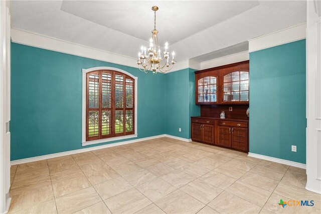 803 S Converse St, Flatonia, TX 78941 - empty room with a chandelier and a raised ceiling
