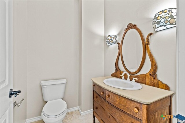 803 S Converse St, Flatonia, TX 78941 - bathroom with vanity and toilet