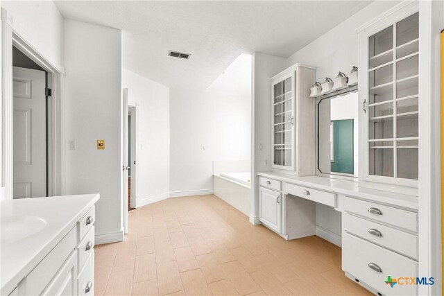 803 S Converse St, Flatonia, TX 78941 - bathroom with vanity and a bath