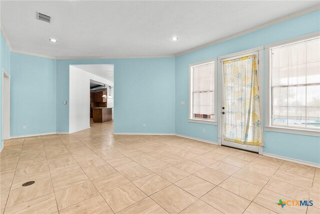 803 S Converse St, Flatonia, TX 78941 - spare room with crown molding and recessed lighting