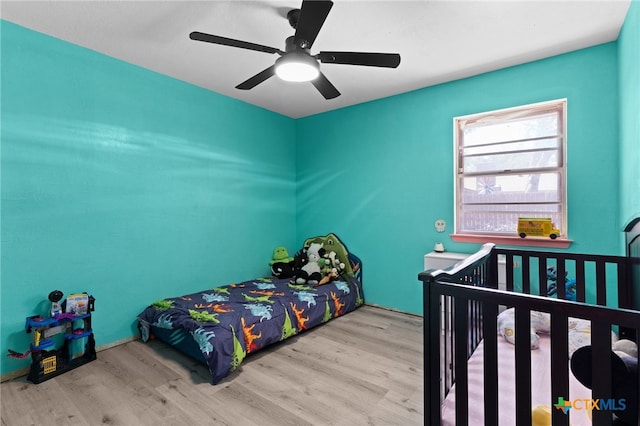 614 Cedar Dr, Copperas Cove, TX 76522 - bedroom with wood finished floors and a ceiling fan