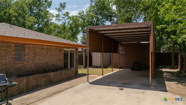 614 Cedar Dr, Copperas Cove, TX 76522 - view of patio / terrace featuring a detached carport and concrete driveway