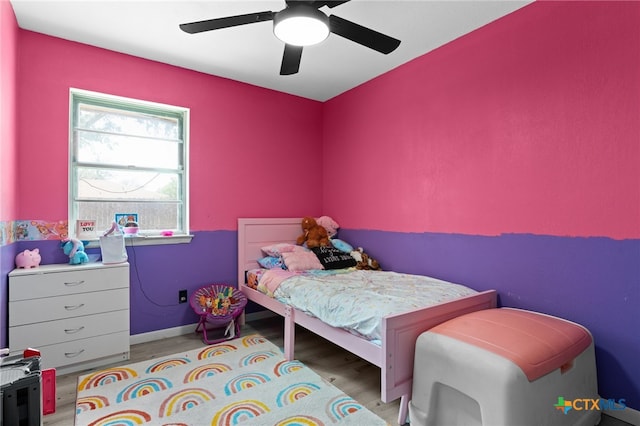 614 Cedar Dr, Copperas Cove, TX 76522 - bedroom featuring light wood finished floors, ceiling fan, and baseboards