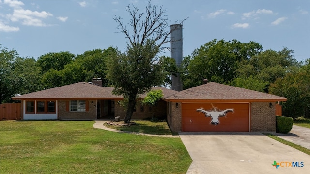 614 Cedar Dr, Copperas Cove, TX 76522 - ranch-style house with driveway, brick siding, and an attached garage